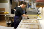 L'Atelier de Reliure, Grenoble : encollage et doublage au papier Japon de documents fragiles. {JPEG}